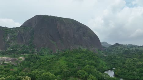 aerial - zuma rock monolith, abuja, nigeria, wide shot forward