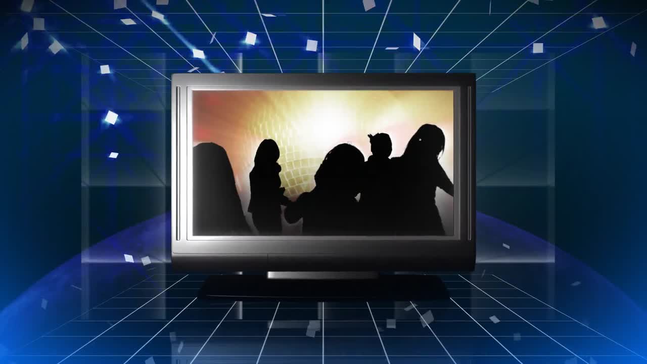 사람들이 춤을 추는 장면을 보여주는 텔레비전