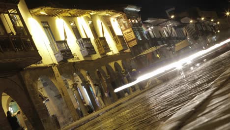 Plaza-de-armas-with-people-and-cars-passing-1