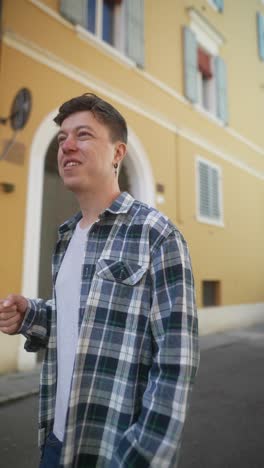 man walking in a city street