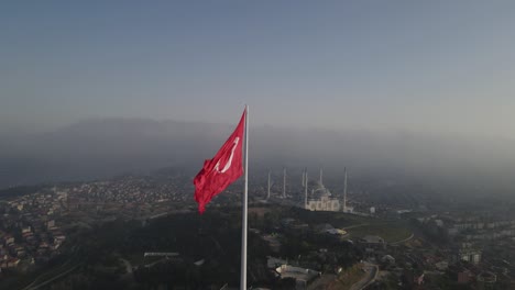 turkish flag in the foggy morning drone video, uskudar istanbul, turkey