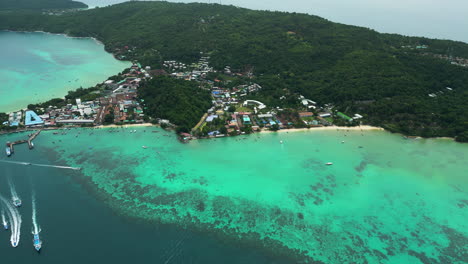 aerial view of phi phi island with topical beach and turquoise water in thailand