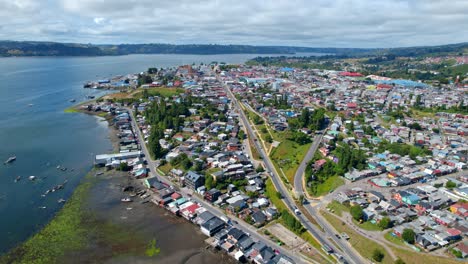 aerial overview of the cityscape of castro city, sunny day in chiloe, chile