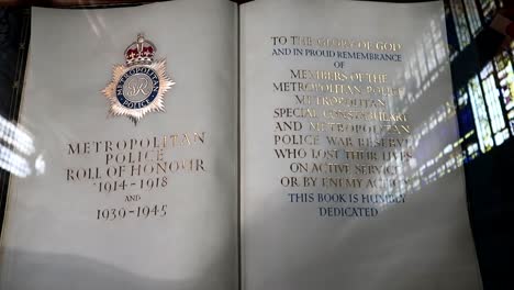 closeup shot of old metropolitan police book in westminster abbey, uk, london