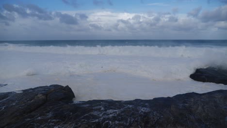 beautiful white waves splashing on rocks - clovelly cliff sydney australia