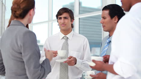 colleagues talking at coffee break