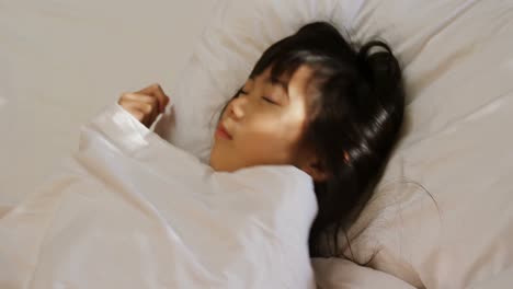 girl sleeping on the bed in bed room 4k