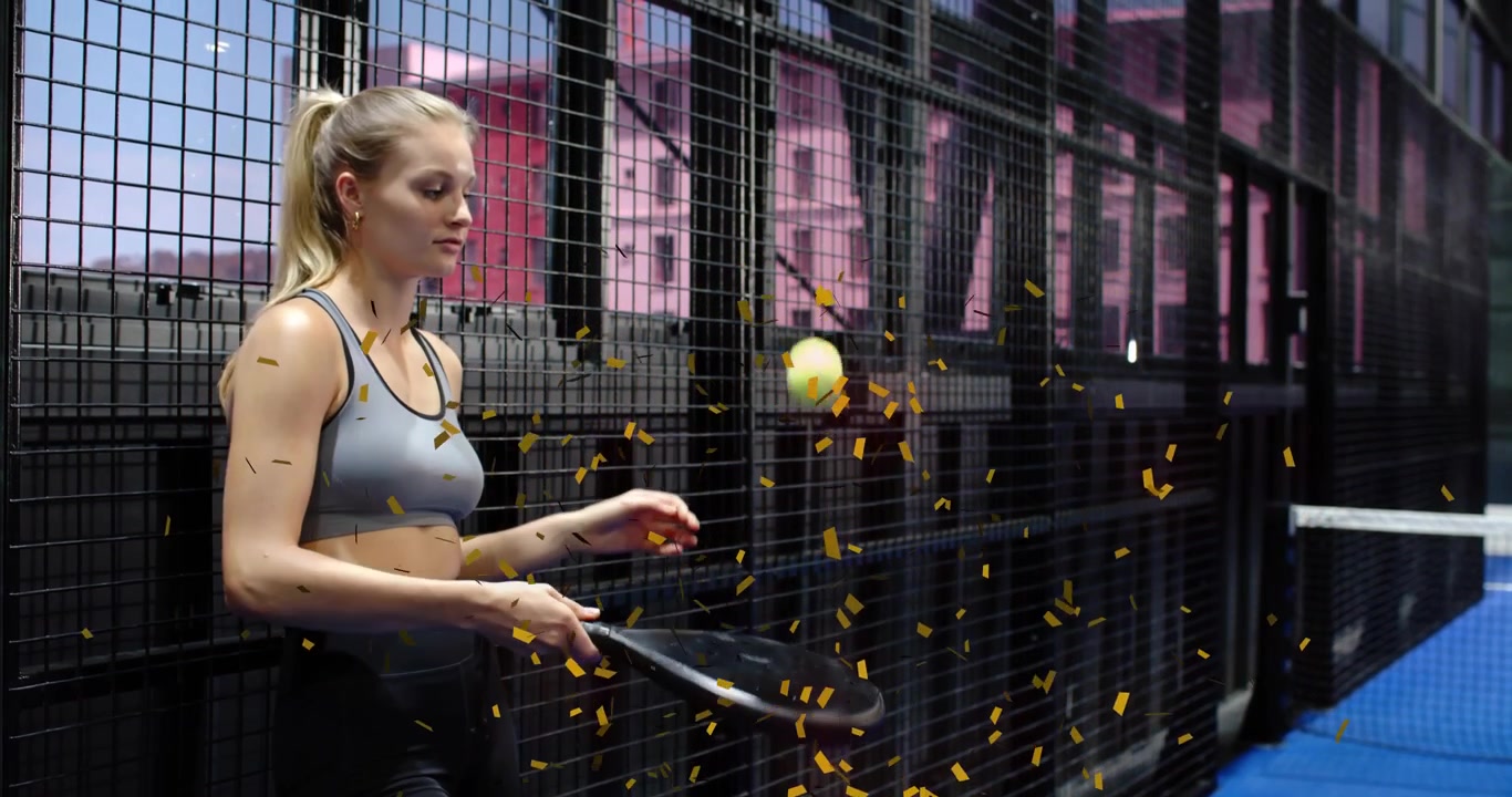 woman pressing ball into racket, bursting gold confetti and bouncing fragments in sports marketing