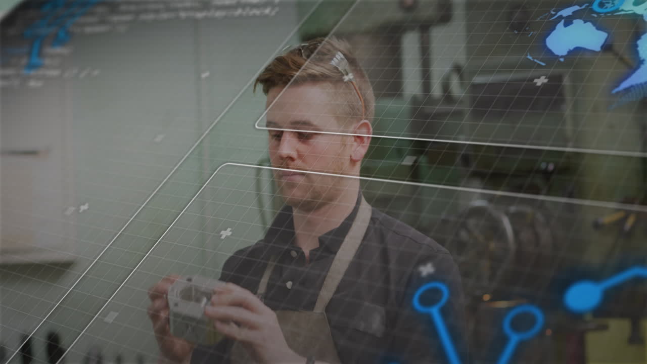 Machinist inspecting mechanical part in industrial workshop, featuring holographic grid with icons