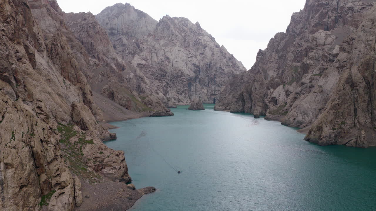 Köl-Suu Alpine Lake In Kyrgyzstan During Rainy Season - Aerial Drone Shot