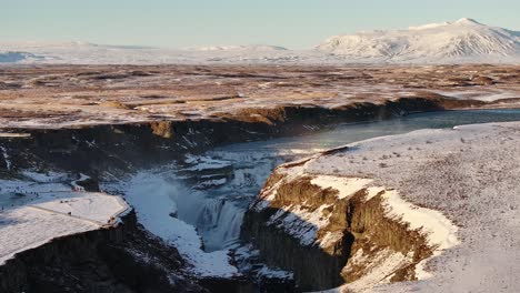 gullfoss waterfall and hvítá river in iceland, snow-covered winter landscape