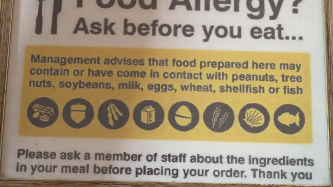 Important food safety guideline emphasizes checking for allergens before ordering at local eatery - Close Up Shot