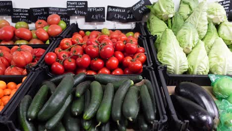 various types of fruits and vegetables for sale at a market