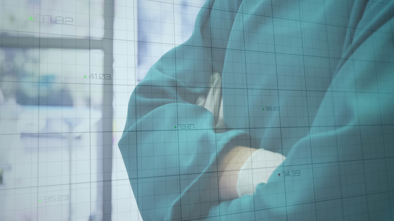 병원의 수술실에서 여성 외과 의사 위에 움직이는 녹색 그래프의 애니메이션