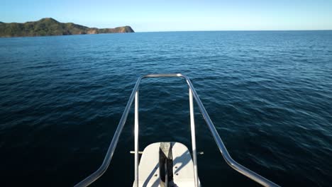 Static-close-up-shot-of-the-bow-of-ship-while-sailing-in-the-tropical-sea-waters-of-Costa-Rica