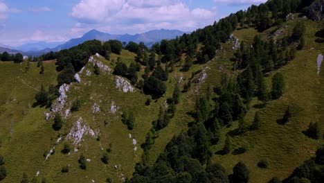 Aerial-Shot-Of-Distant-Virgin-Mountains-By-Como-Lake,-Porta-Di-Prada-Plave,-Italy