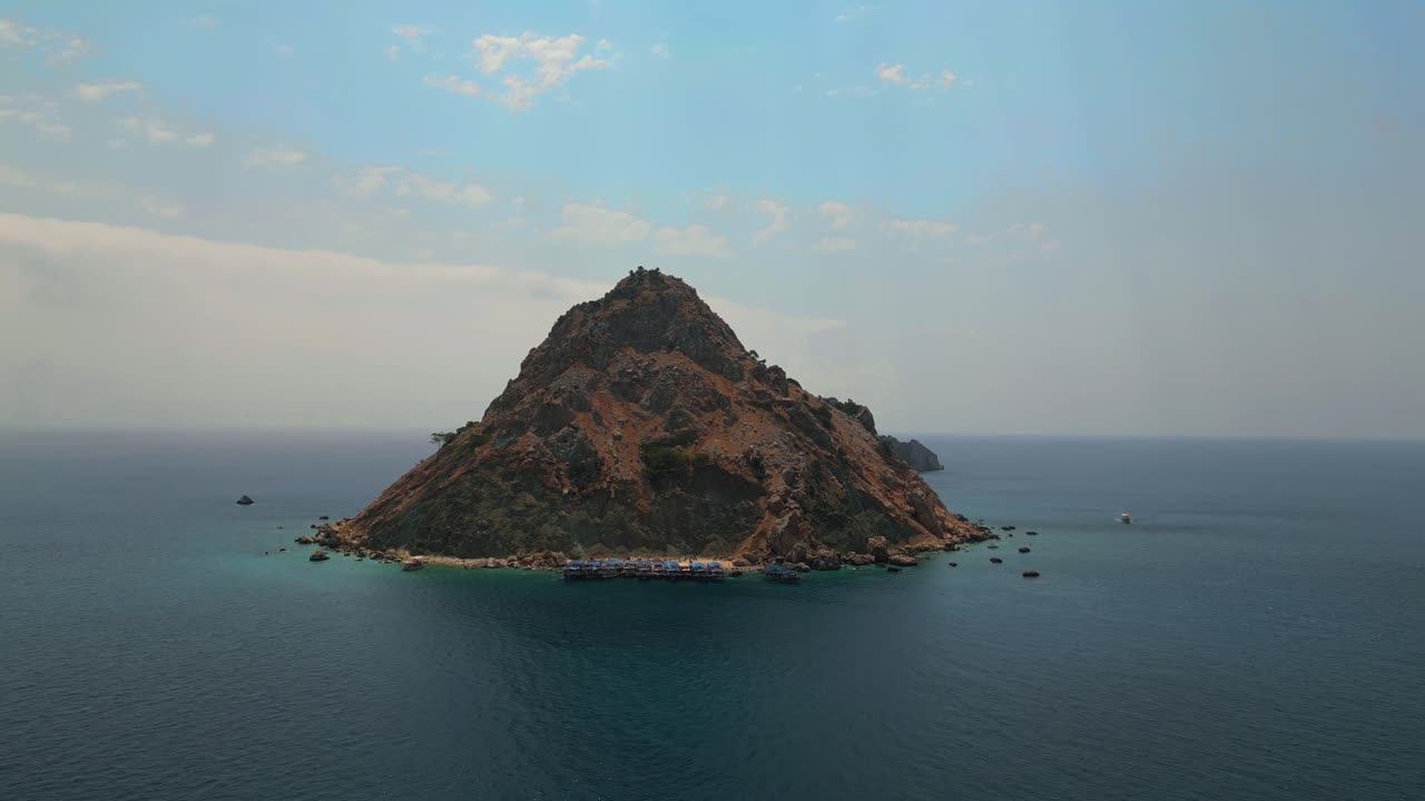 Stunning aerial footage captured by drone showcasing the crystal-clear turquoise waters and white sand beaches of Suluada Island - 4K Cinematic Drone Footage - Suluada - Turkey_04