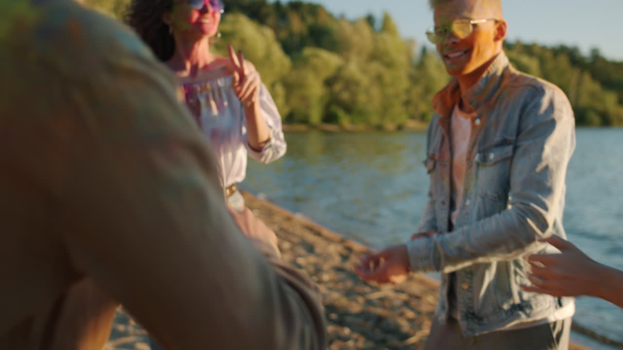 Friends Celebrating Holi at the Beach