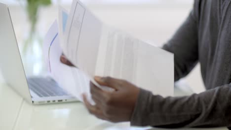 Man-Working-From-Home-at-Laptop