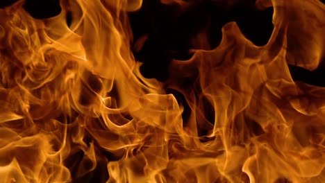 Flames-of-fire-on-black-background-in-slow-motion