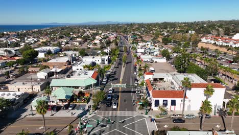 drone video rotating shot with an overview of the city of encinitas in southern california, usa on a beautiful sunny day