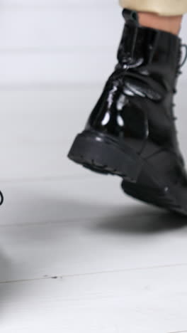 rotating woman shoes showroom. boutique lifestyle posing in store. vertical video