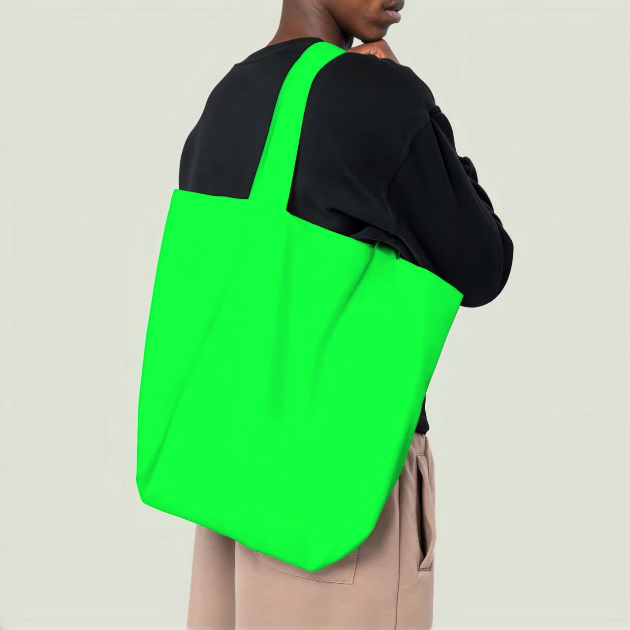 Animazione di mockup live di una borsa tote bag in area di lavoro, video 4K trasparente, green screen