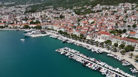 Drone aerial view of makarska harbour town city croatia balkan country balkans Biokovo mountains