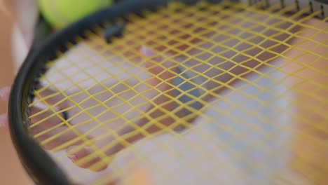 beautiful tennis girl practicing serve on outdoor court