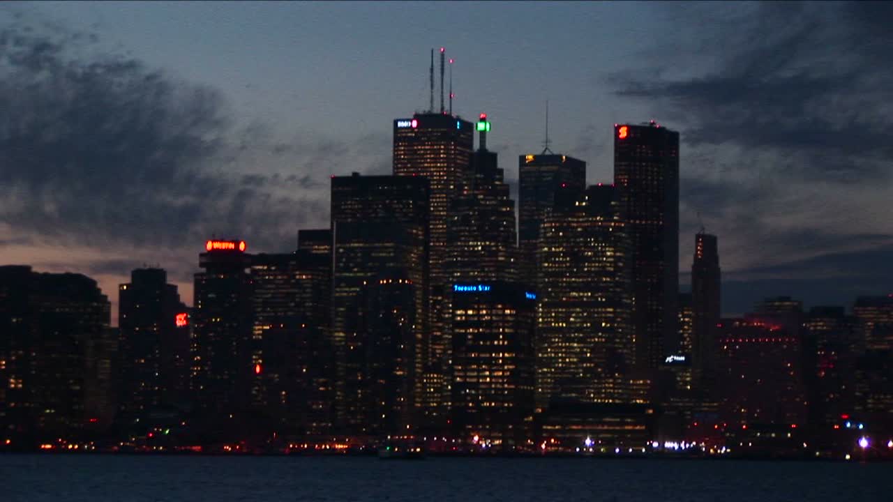 Toronto At Night With Lights From Across Lake Ontario