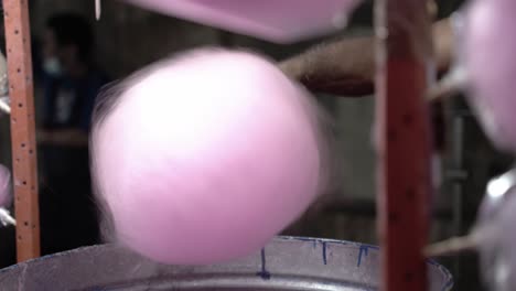 making cotton candy with a machine