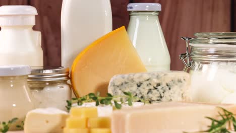 various dairy items displayed on a wooden surface