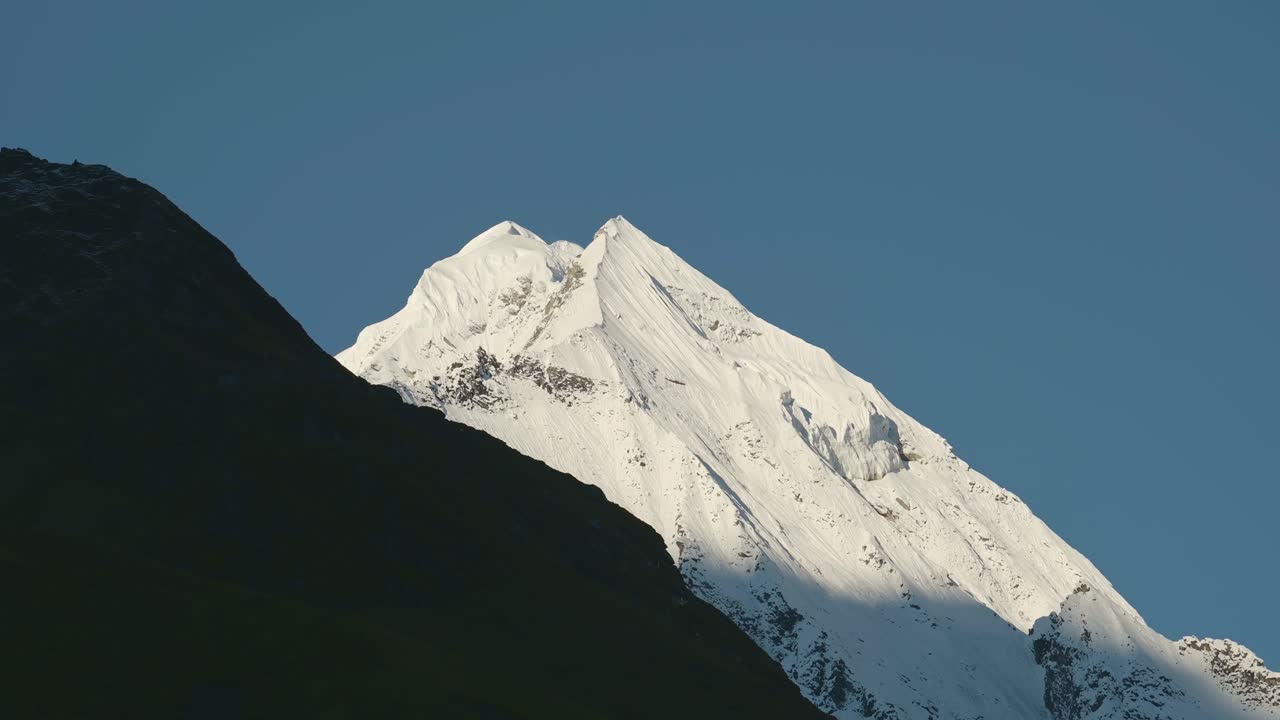 Snowcapped Mountains and Clear Blue Sky, Snowy Winter Himalayas Mountains Covered in Snow in Nepal, Annapurna Mountain Range a Popular Hiking and Trekking Area in Nepal