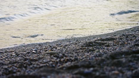 Ocean-waves-in-slow-motion-at-the-beach-on-a-dark-day