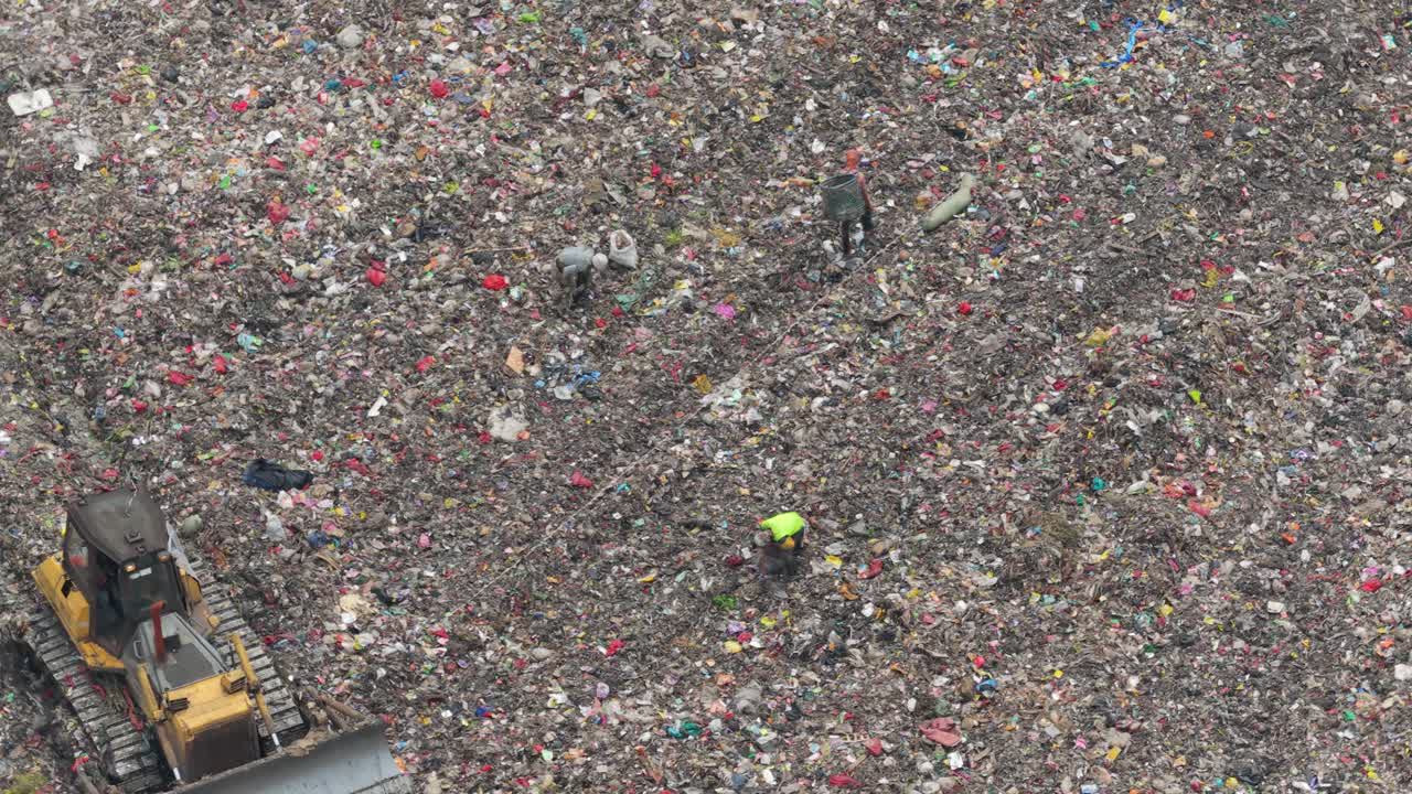 Aerial view of people scavenging in bantar gebang landfill