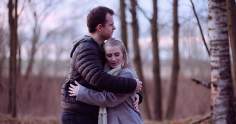 Young-People-Hugs-In-The-Autumn-Forest-1