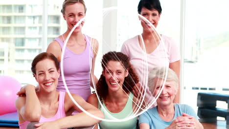 smiling women in fitness attire with abstract white lines animation over them