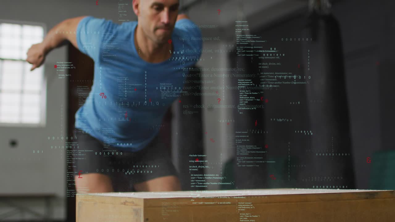 Male athlete lowering hips, swinging arms, launching plyo box jumps for fitness, code overlaying