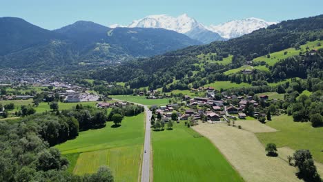 scenic road to mont blanc in french alps - aerial dolly forward