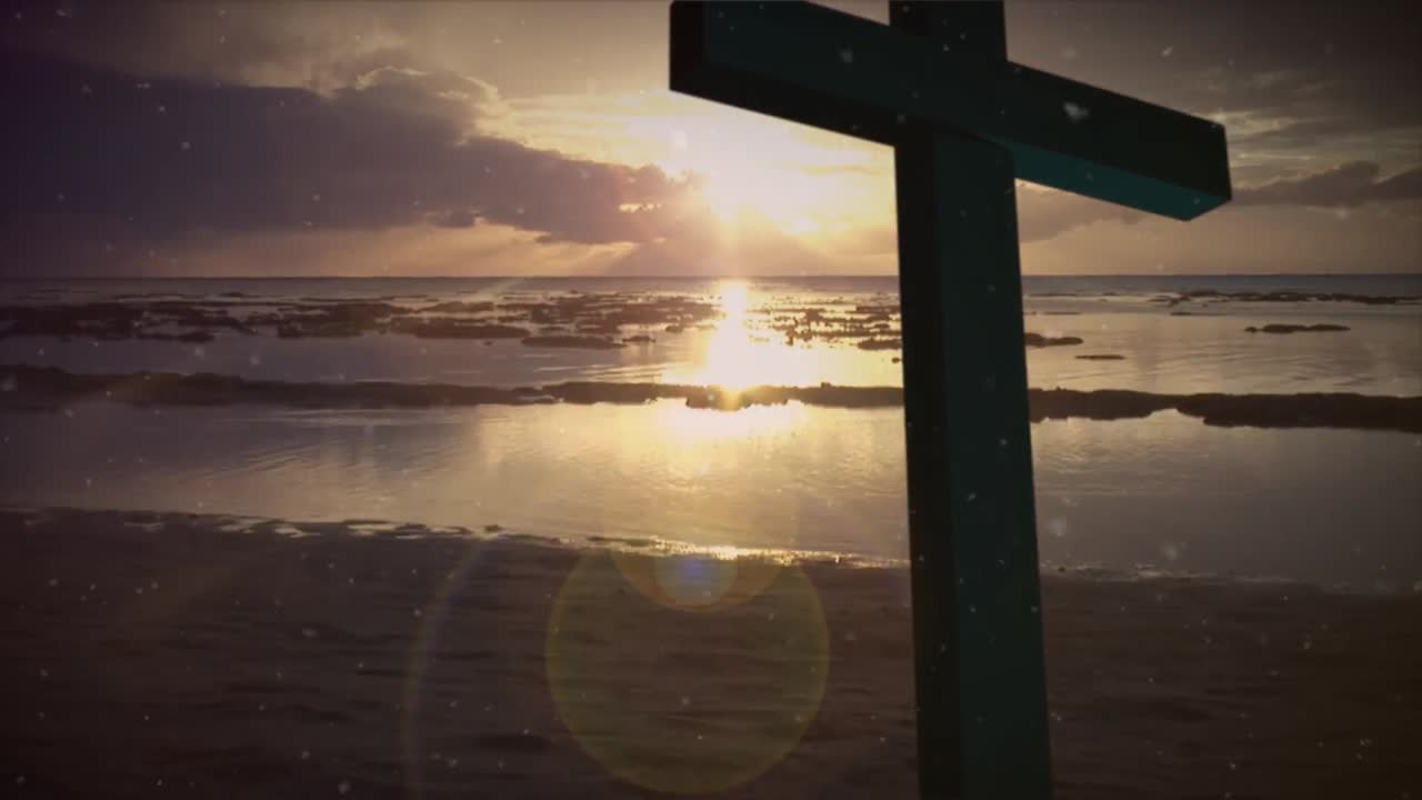 십자가와 해양 풍경 위에 빛나는 불빛의 애니메이션