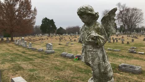 angel on top of gravestone