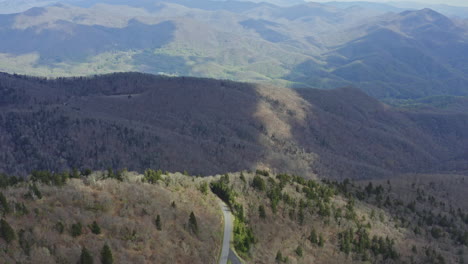 car driving down blue ridge parkway in vast appalachian mountain range