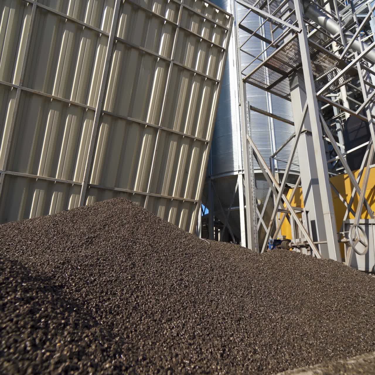 Factory for the production of mixed fodders. Industrial equipment on a compound feed plant. Grain elevator