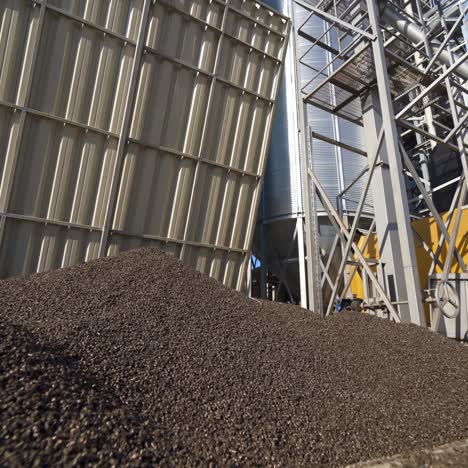 factory for the production of mixed fodders. industrial equipment on a compound feed plant. grain elevator