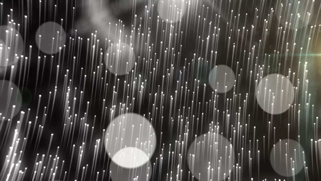 검은색 배경에서 움직이는  ⁇ 색 별과 보케 빛 반점의 애니메이션