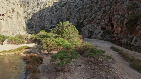 Rugged-Mountains-In-Sa-Calobra-Beach,-Balearic-Islands,-Mallorca,-Spain---drone-shot