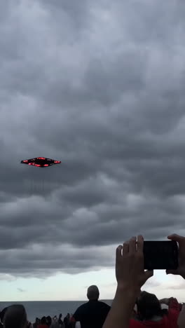 drone or kite shaped like ufo at the beach