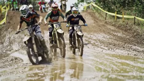 motocross race in muddy conditions