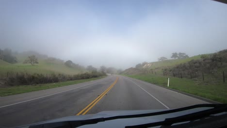 time lapse hyperlapse driving through dense fog banks in california hills in los padres national forest