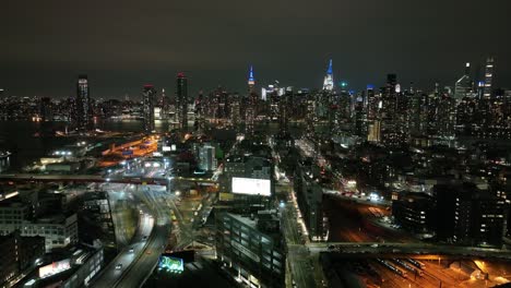 an aerial view from over long island city, new york at night